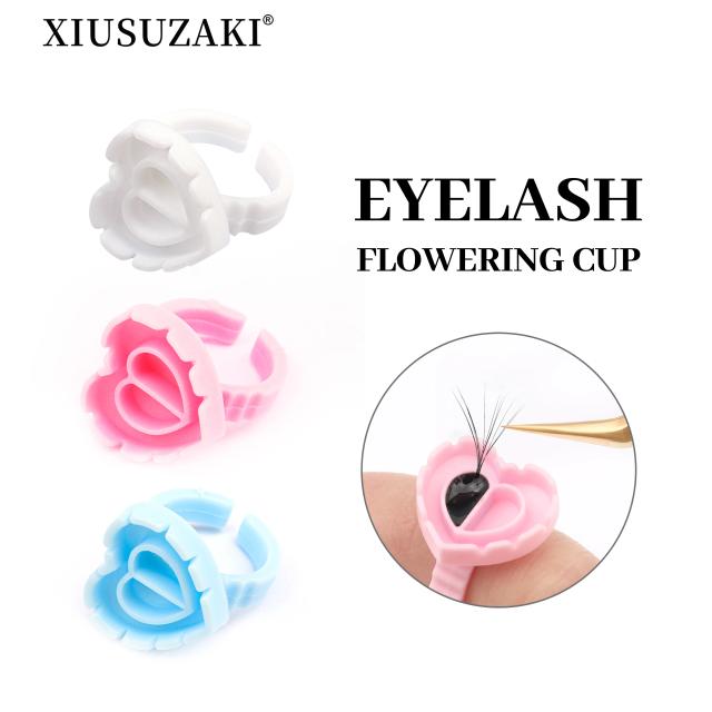 XIUSUZAKI Wholesale 100Pcs/Bag Disposable Eyelash Extension Glue Ring Cup Tattoo Pigment Holder Container Lash Tools Supplier on Productcaster.