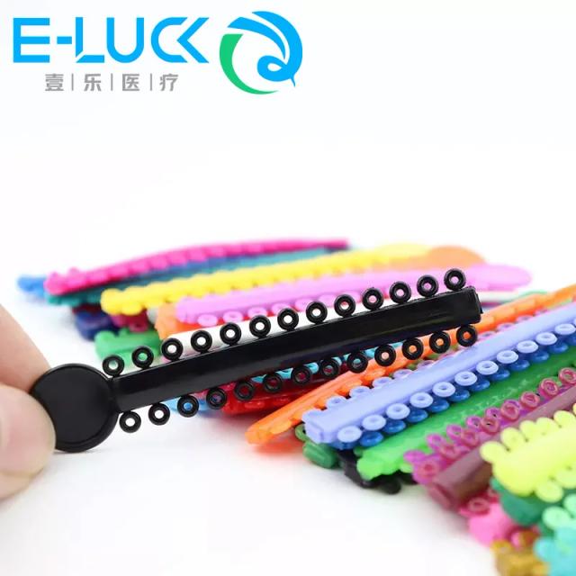 40pcs/bag Dental Orthodontics Elastic Ligature Ties Elastomeric Dental Ligating Modules /ligature ties on Productcaster.