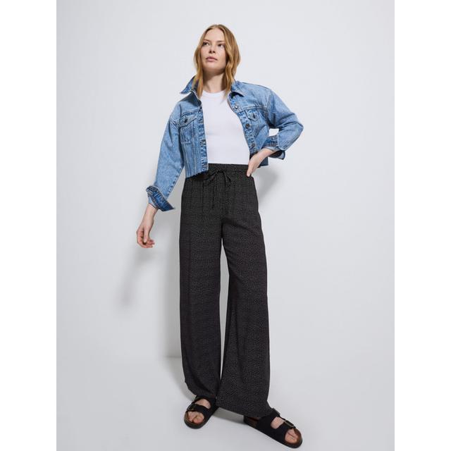 Women's Navy Spot Loose Fit Trousers - 100% Viscose on Productcaster.