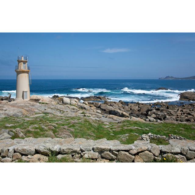 Lighthouse of Muxia - Wrapped Canvas Photograph Breakwater Bay Size: 51cm H x 76cm W on Productcaster.