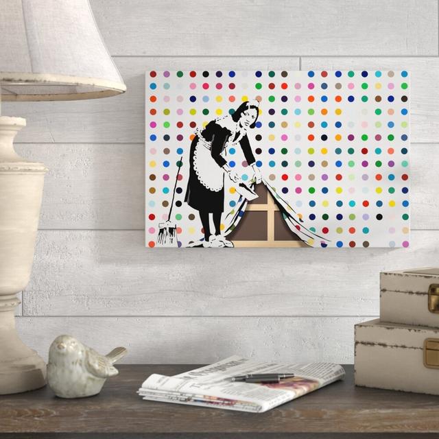 Maid with Dots by Banksy - Wrapped Canvas Graphic Art Print East Urban Home Size: 102 cm H x 152 cm W x 4 cm D on Productcaster.