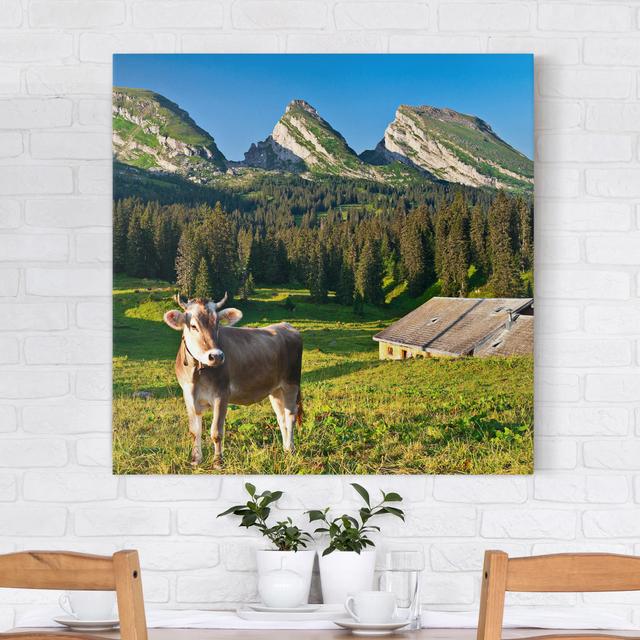 Leinwandbild Swiss Alpine Meadow with Cow East Urban Home Größe: 60 cm H x 60 cm B x 2 cm T on Productcaster.