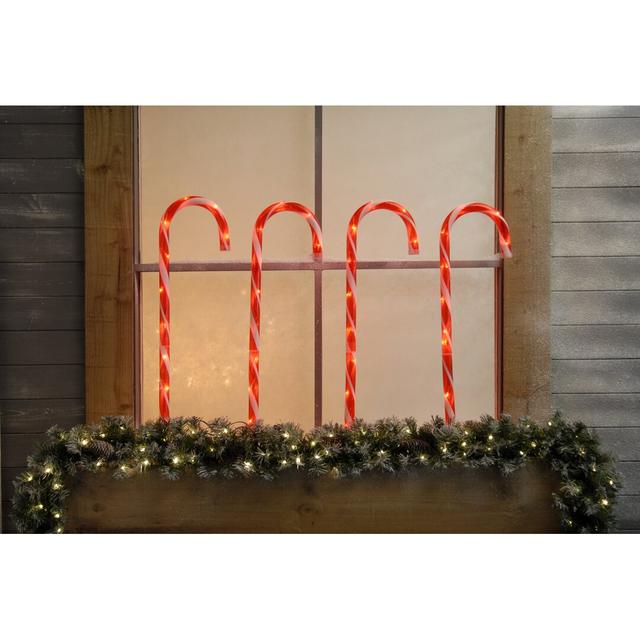 Candy Cane Garden Stake (Set of 4) The Seasonal Aisle Colour: Red on Productcaster.