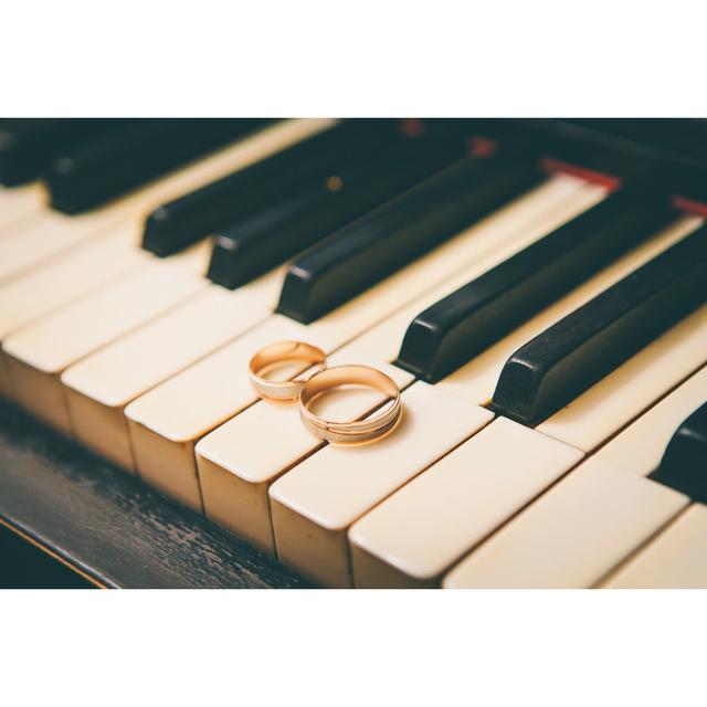 Wedding Rings On Piano - Wrapped Canvas Print 17 Stories Size: 61cm H x 91cm W x 3.8cm D on Productcaster.