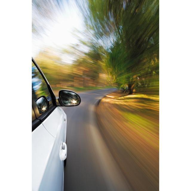 Car In Fast Motion - Wrapped Canvas Print 17 Stories Size: 46cm H x 30cm W on Productcaster.