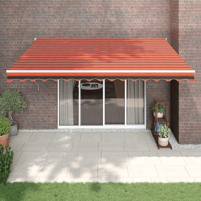 Frew Polyester Retractable Patio Awning Happy Larry Pattern: Striped, Size: 450cm W x 300cm D, Colour: Orange/Brown on Productcaster.