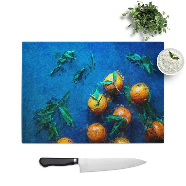 Glass Fresh Oranges Chopping Board East Urban Home Size: 28.5 cm W x 20 cm L on Productcaster.