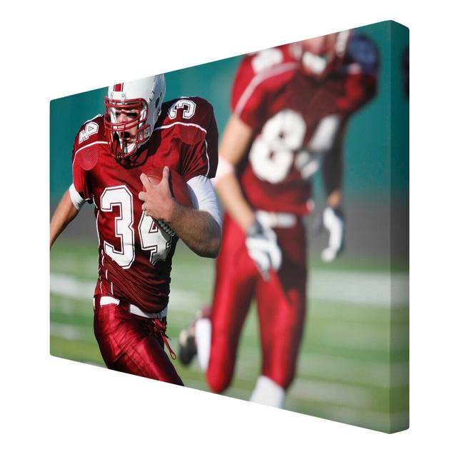 Running Back Photographic Art Print on Canvas East Urban Home Size: 180cm L x 120cm W on Productcaster.