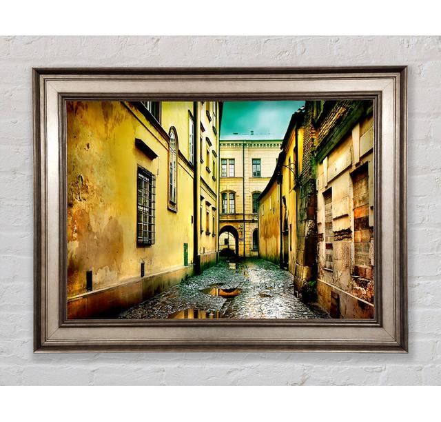 Italian Walkways Rain Framed Print Ebern Designs Size: 21cm H x 42cm W x 8cm D, Format: Antique Silver Framed Paper on Productcaster.