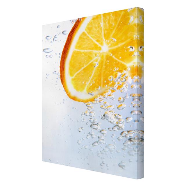 Splash Orange - Wrapped Canvas Graphic Art Print East Urban Home Size: 150cm L x 100cm W on Productcaster.