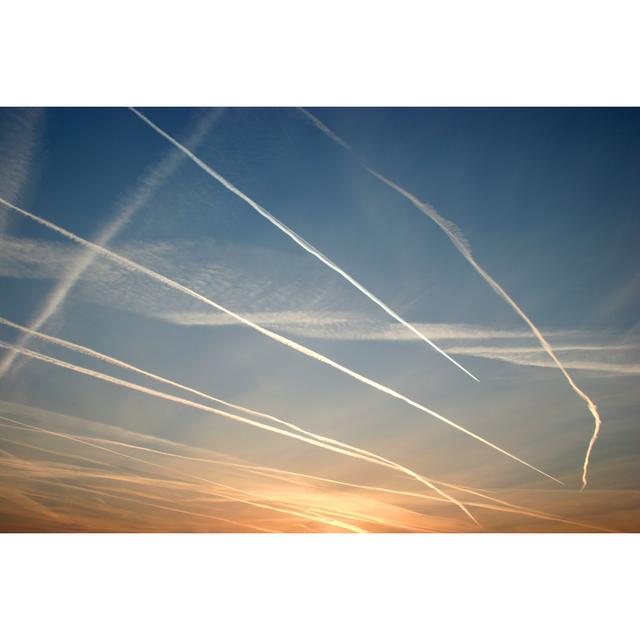 A Lot Of Vapor Trails During Sunset - Print 17 Stories Size: 61cm H x 91cm W on Productcaster.