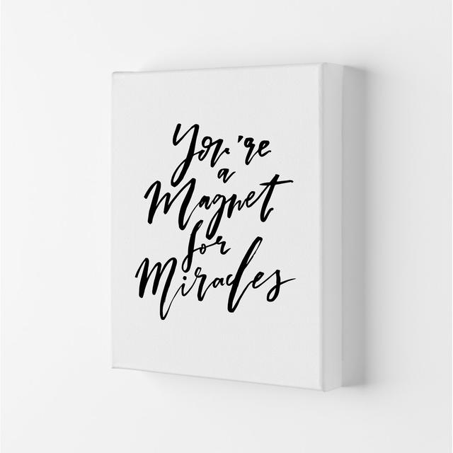 You're a Magnet for Miracles - Typography Print on Paper Happy Larry Frame Option: Wrapped Canvas, Size: 84.1cm H x 59.4cm W x 4cm D on Productcaster.