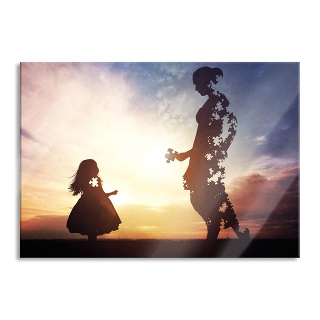 Glasbild Silhouette Puzzle Mutter und Kind Maturi Größe: 60 cm H x 80 cm B x 0,4 cm T on Productcaster.