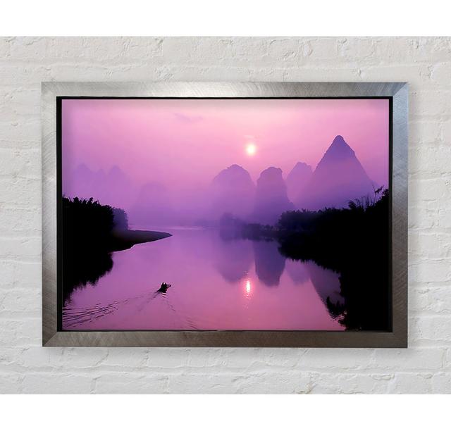 Purple Paradise Lake Framed Print Ebern Designs Size: 59.7cm H x 84.1cm W x 3.4cm D, Colour: Pink/Blue, Format: Silver Framed Paper on Productcaster.