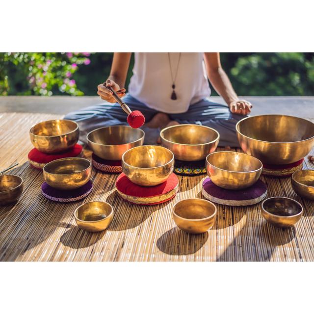 Woman Playing On Tibetan Singing Bowl - Wrapped Canvas Print 17 Stories Size: 20cm H x 30cm W x 3.8cm D on Productcaster.