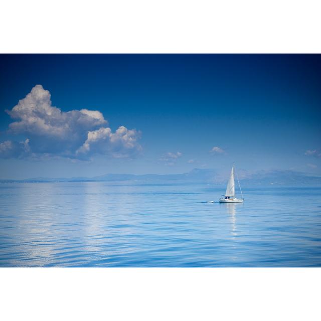 White Sailboat At Open Sea On Sunny Day - Wrapped Canvas Print Longshore Tides Size: 61cm H x 91cm W on Productcaster.