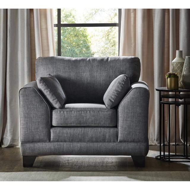 Aadil Upholstered Armchair Lark Manor Upholstery Colour: Charcoal on Productcaster.