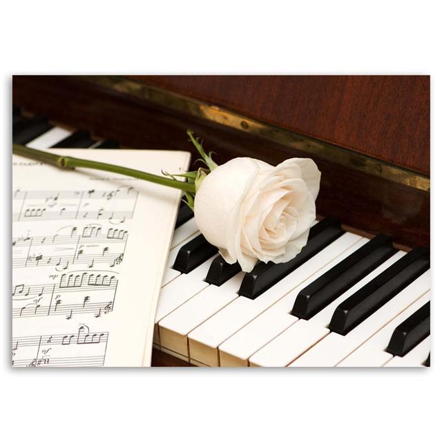 Canvas print, Rose on a piano Ebern Designs on Productcaster.