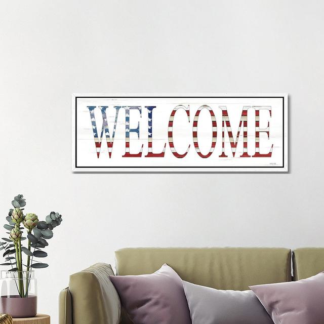 Patriotic Welcome by Cindy Jacobs - Panoramic Typography on Canvas Happy Larry Size: 40.64cm H x 121.92cm W x 3.81cm D, Format: White Floater Frame on Productcaster.