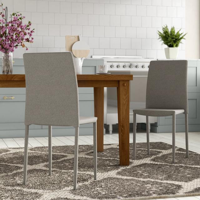 4-Piece Upholstered Dining Chair Set in Grey with Solid Back by Brayden Studio on Productcaster.