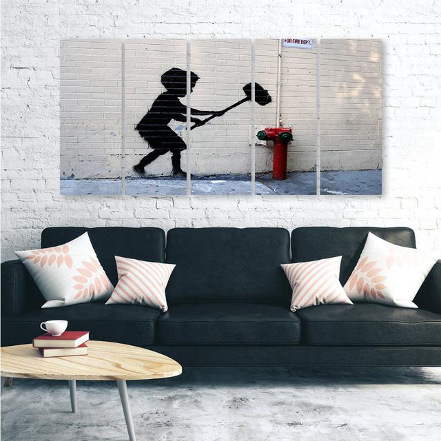 Leinwandbild Banksy Hammer Boy Street Ebern Designs Größe: 80 cm H x 200 cm B on Productcaster.