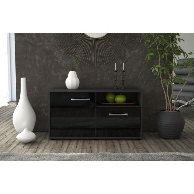 The Murvin TV Stand is made of oak and anthracite 17 Stories Colour: Black/Anthracite on Productcaster.