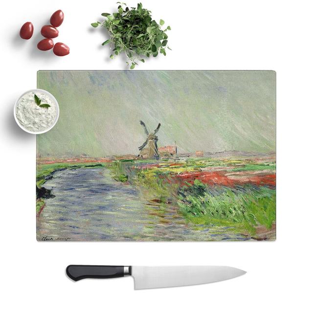 Field of Tulips, Holland by Claude Monet Chopping Board East Urban Home Size: 28.5cm W x 39cm L on Productcaster.