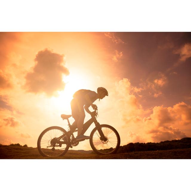 Mountain Bicycle Rider on the Hill by Tomwang112 - Wrapped Canvas Photograph Marlow Home Co. Size: 51cm H x 76cm W on Productcaster.