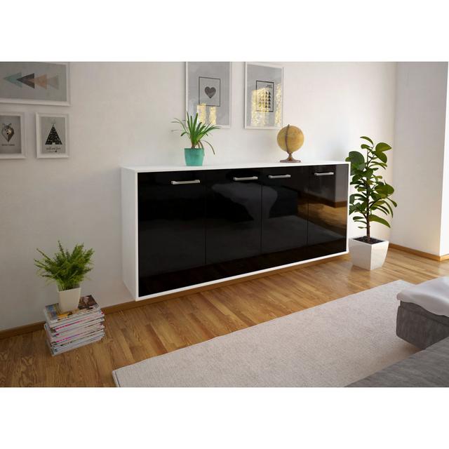 Sideboard Lakewood, flying/metal handles, size: 180x79x35cm Ebern Designs Colour: Black/White on Productcaster.