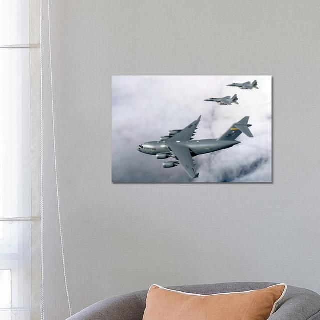 F-15B Eagles Escort The First Hawaii-Based C-17 Globemaster III To Its Home II - Wrapped Canvas Print Borough Wharf Size: 45.72cm H x 66.04cm W x 1.91 on Productcaster.