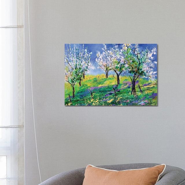 Orchard in Spring by Pol Ledent - Wrapped Canvas Painting ClassicLiving Size: 45.72cm H x 66.04cm W x 1.91cm D on Productcaster.