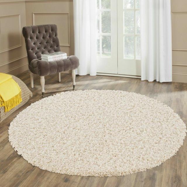 Round Aanuoluwa Solid Colour Machine Woven Round 120cm Area Rug Brayden Studio on Productcaster.