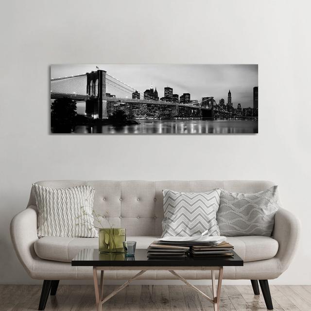 Brooklyn Bridge Across The East River At Dusk, Manhattan, New York City, New York State, Usa by Panoramic Images - No Frame Panoramic Print on Canvas on Productcaster.