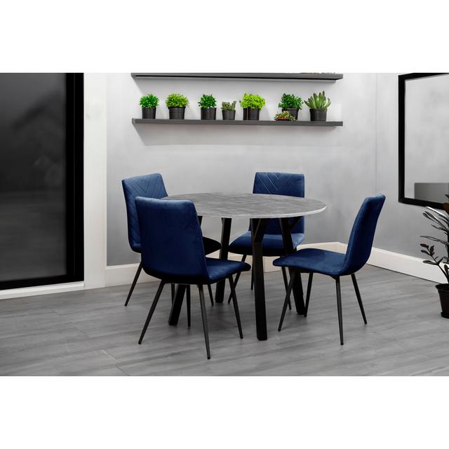 1.1m Round Table & 4 Chairs George Oliver Chair Colour: Blue, Table Base Colour: Black, Table Top Colour: Grey on Productcaster.