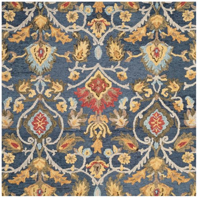 Ferrera Hand Tufted Wool Blue/Brown Rug Blue Elephant Rug Size: Square 152cm on Productcaster.