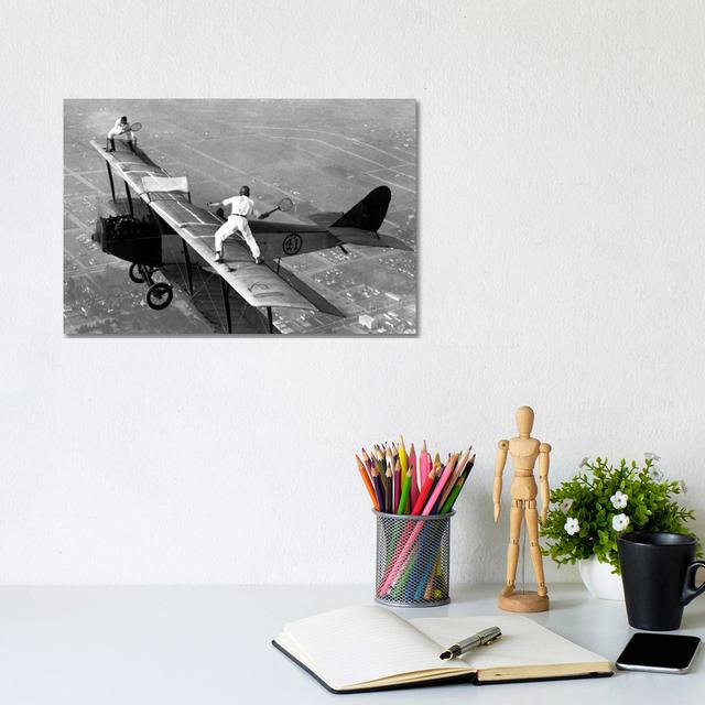 Playing Tennis on a Biplane in 1925 - Wrapped Canvas Photograph Borough Wharf Size: 20.32cm H x 30.48cm W x 1.91cm D on Productcaster.