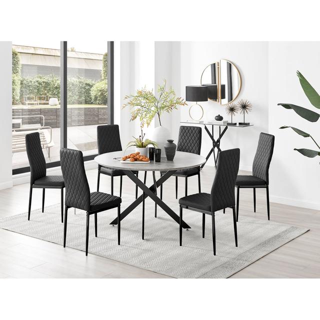 Tierra Modern Chrome Metal & Glass Round Dining Table Set with Quilted Faux Leather Chairs Canora Grey Number of Chairs: 6, Chair Colour: Black on Productcaster.