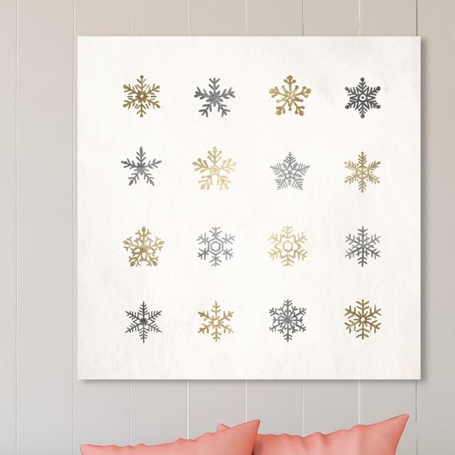 'Snowflakes Silver and Gold' Graphic Art on Wrapped Canvas East Urban Home Size: 109.2 cm H x 109.2 cm W x 3.8 cm D on Productcaster.