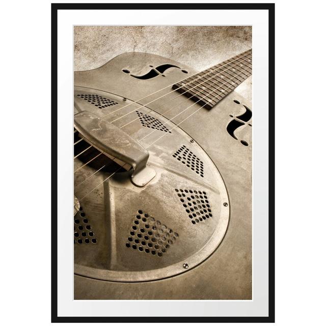 Gerahmtes Poster Wunderschöne alte Gitarre East Urban Home Größe: 100 cm H x 70 cm B on Productcaster.