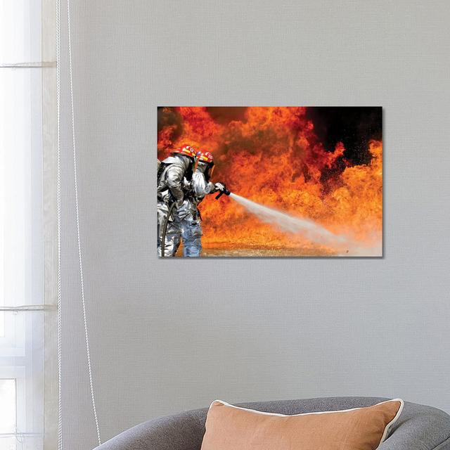 Firefighters Combat a Jp-8 Jet Fuel Fire - Wrapped Canvas Photograph Latitude Run Size: 45.72cm H x 66.04cm W x 3.81cm D on Productcaster.