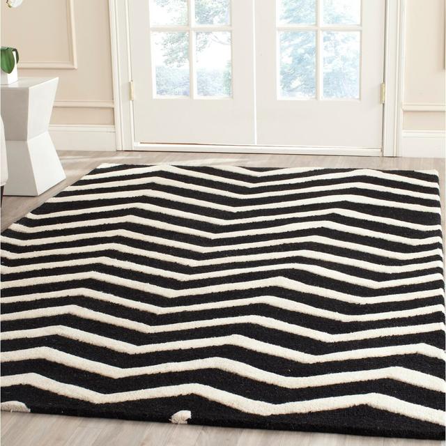 Betton Hand Tufted Wool Black/Ivory Rug Ebern Designs Rug Size: Rectangle 121 x 182cm on Productcaster.