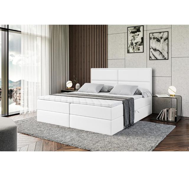 Boxspringbett Cristinia in Kunstlederoptik mit H4 Multipocket-Matratze, Bettkasten und Topper ModernMoments Größe: 180 x 200 cm, Farbe: Weiß on Productcaster.