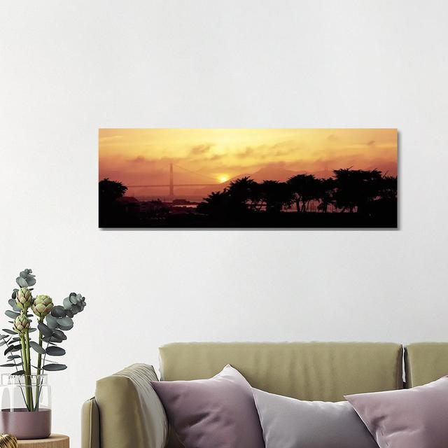 Silhouette Of Trees At Dusk With A Bridge In The Background, Golden Gate Bridge - Wrapped Canvas Panoramic Print Ebern Designs Size: 40.64cm H x 121.9 on Productcaster.