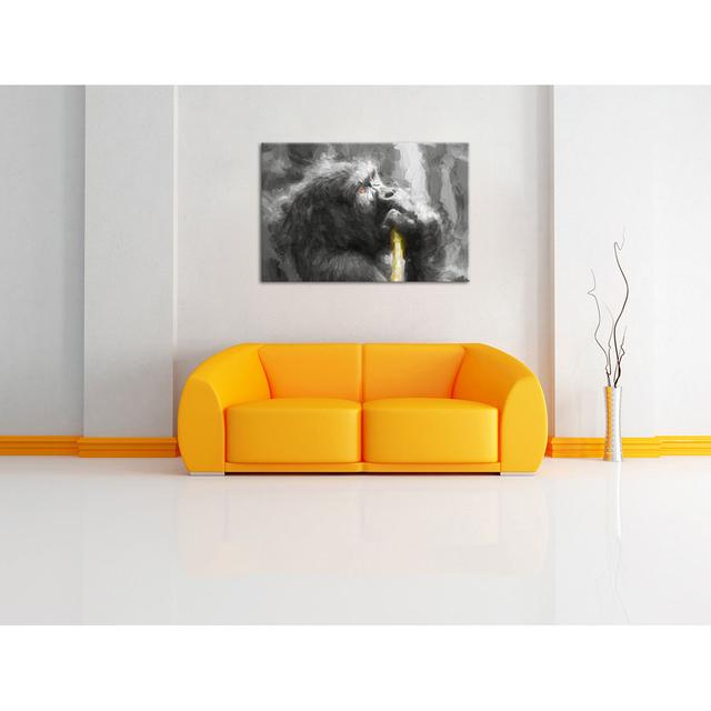 Leinwandbild Stolzer Gorilla isst East Urban Home Größe: 70 cm H x 100 cm B on Productcaster.