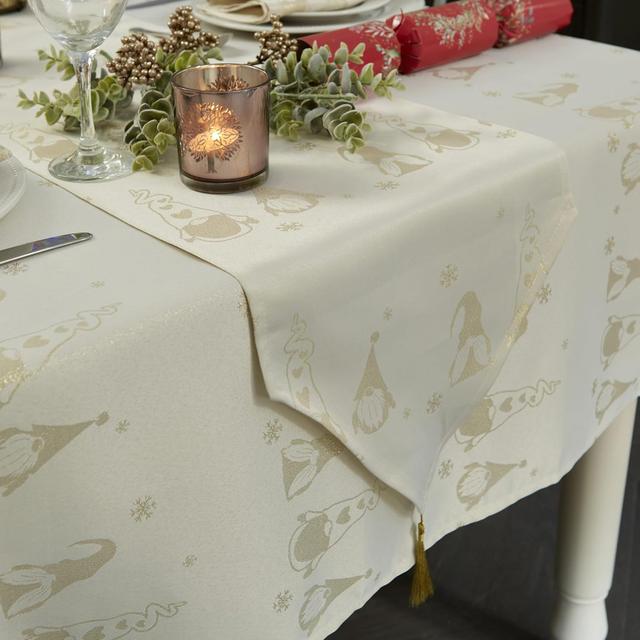 Christmas Metallic Gonk Tasselled Table Runner The Seasonal Aisle Size: 244 x 13cm, Colour: Cream on Productcaster.