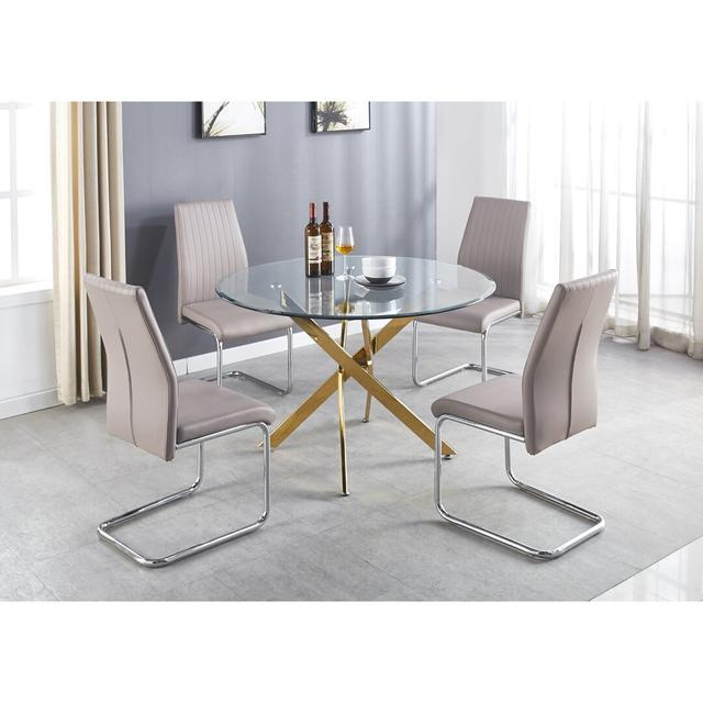 Tierra Modern Chrome Metal & Glass Round Dining Table Set with 4 Upholstered Faux Leather Chairs Etta Avenue Table Size: H76 x L120 x W120cm, Colour ( on Productcaster.