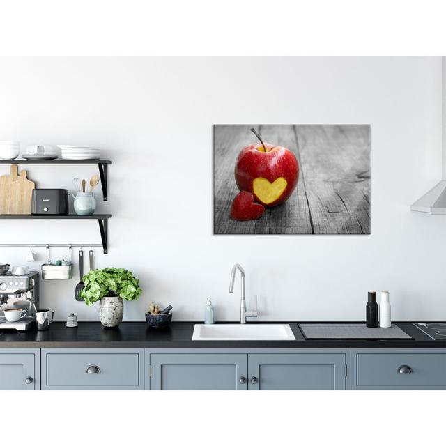 Heart Carving In An Apple - No Frame Print on Glass Brayden Studio Size: 60cm H x 80cm W on Productcaster.