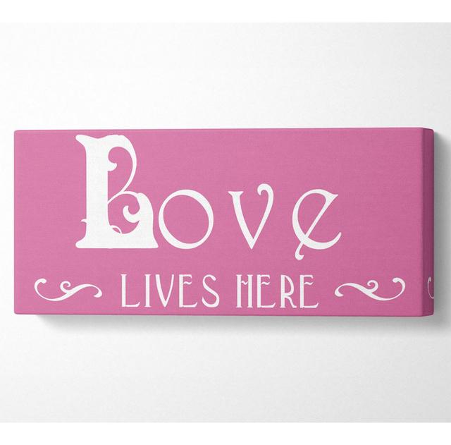 Love Quote Love Lives Here Vines Pink Panoramic Canvas Happy Larry Size: 40.6cm H x 101.6cm W on Productcaster.