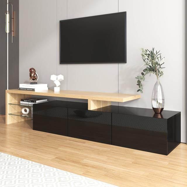 TV-Ständer Caymus für TVs bis zu 60" Perspections Farbe: Schwarz/Naturbelassen on Productcaster.