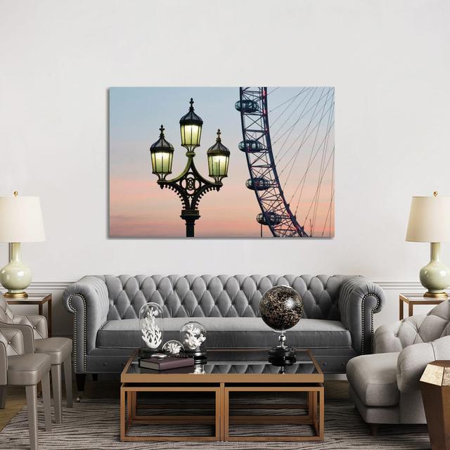 Street Lamp With London Eye In The Background by Jan Becke - Wrapped Canvas Gallery-Wrapped Canvas Giclée Latitude Run Size: 101.6cm H x 152.4cm W x 3 on Productcaster.